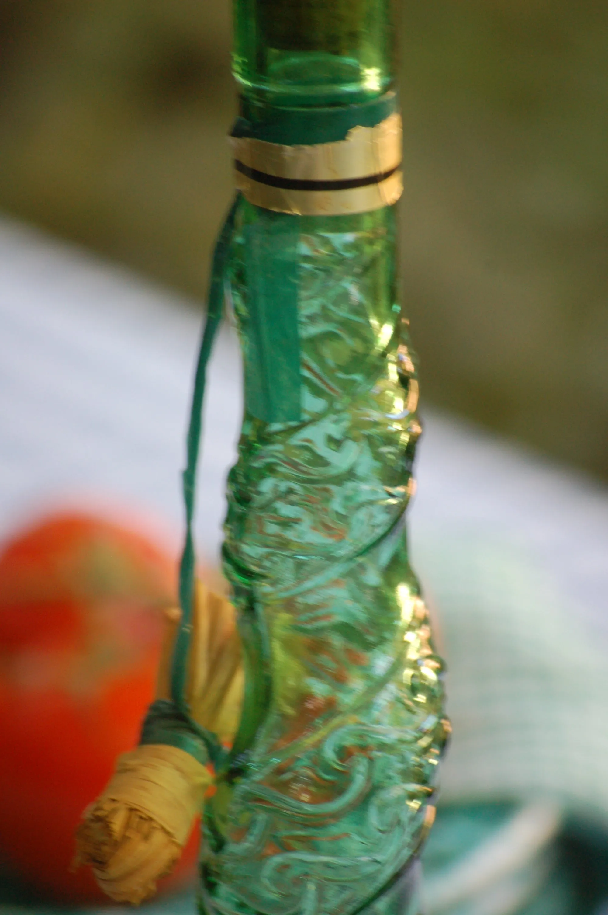 Large Vintage Emerald green Spiral glass decanter from Empoli, Italy. Spiral design with floral convolute embossing. Genie bottle